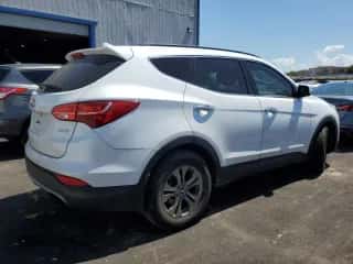 2014 Hyundai Santa Fe z VIN 5XYZU3LB0EG156566, wystawiony jako Copart lot #70406135 z przebiegiem 113 866 mil mil oraz Czysty tytuł • Clean title. Historia ofert i sprzedaży dostępna na DreamBid. Obrazek 3.