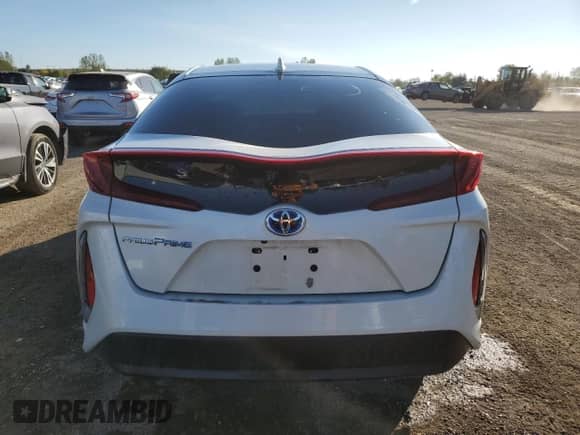 2018 Toyota Prius Plus z VIN JTDKARFP0J3079152, wystawiony jako Copart lot #80650285 z przebiegiem 77 519 mil mil oraz Szkoda całkowita • Salvage title. Historia ofert i sprzedaży dostępna na DreamBid. Obrazek 6.