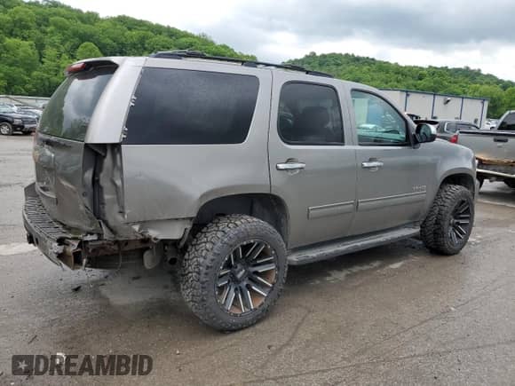 2012 Chevrolet Tahoe LS z VIN 1GNSKAE05CR222364, wystawiony jako Copart lot #57340535 z przebiegiem 122 645 mil mil oraz Szkoda całkowita • Salvage title. Historia ofert i sprzedaży dostępna na DreamBid. Obrazek 3.