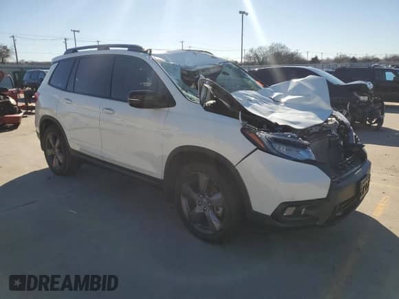 2021 Honda Passport Touring с VIN 5FNYF7H99MB009607, выставлен на аукционе Copart как лот 86992664 с пробегом Не указан миль и Списание • Salvage title. История ставок и продаж доступна на DreamBid. Изображение 4.