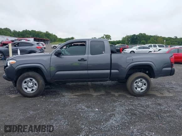 2023 Toyota Tacoma SR with VIN 3TYSX5EN6PT021792, listed as a IAAI auction lot 43037546 with 20,673 mi miles and . Bid and sale history available at DreamBid. Image 14.