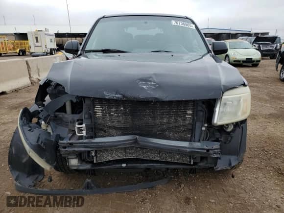 2008 Mercury Mariner Premier with VIN 4M2CU97188KJ32728, listed as a Copart auction lot 70736905 with 217,659 mi miles and Salvage title. Bid and sale history available at DreamBid. Image 5.