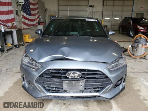 2019 Hyundai Veloster Premium z VIN KMHTG6AF5KU019911, wystawiony jako Copart lot #59309185 z przebiegiem 122 598 mil mil oraz Szkoda całkowita • Salvage title. Historia ofert i sprzedaży dostępna na DreamBid. Obrazek 5.