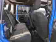 2021 Jeep Wrangler Unlimited Sport Altitude with VIN 1C4HJXDNXMW715577, listed as a Copart auction lot 61032615 with 91,517 mi miles and Salvage title. Bid and sale history available at DreamBid. Image 10.