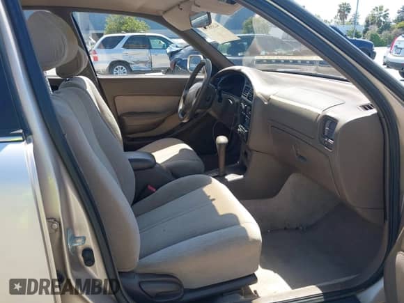 1995 Toyota Camry LE z VIN 4T1GK12E0SU860849, wystawiony jako IAAI lot #42358373 z przebiegiem 162 463 mil mil oraz . Historia ofert i sprzedaży dostępna na DreamBid. Obrazek 5.