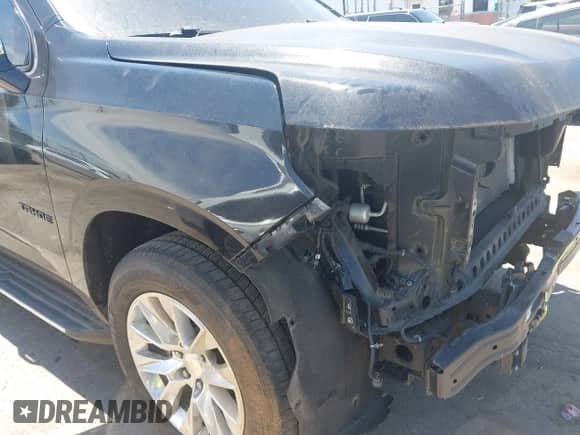 2021 Chevrolet Tahoe Premier z VIN 1GNSKSKD3MR116235, wystawiony jako IAAI lot #42624157 z przebiegiem 84 692 mil mil oraz . Historia ofert i sprzedaży dostępna na DreamBid. Obrazek 18.