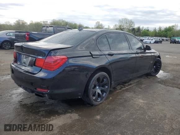 2011 BMW 7 Series 740Li with VIN WBAKB4C5XBC574119, listed as a Copart auction lot 54946445 with Not provided miles and Salvage title. Bid and sale history available at DreamBid. Image 3.