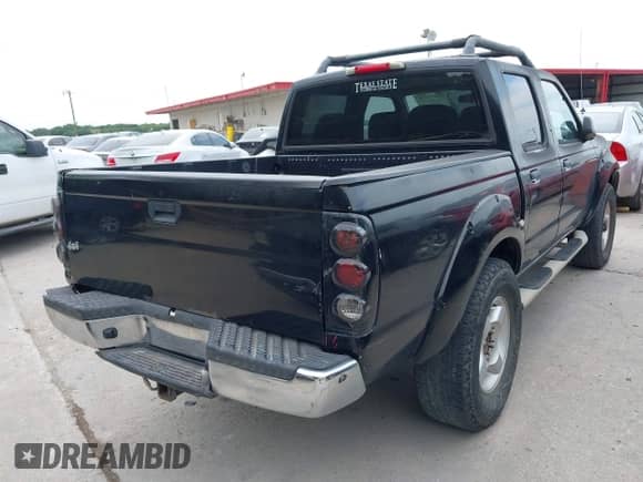 2000 Nissan Frontier XE with VIN 1N6ED27Y1YC355218, listed as a IAAI auction lot 42970732 with 191,142 mi miles and . Bid and sale history available at DreamBid. Image 4.