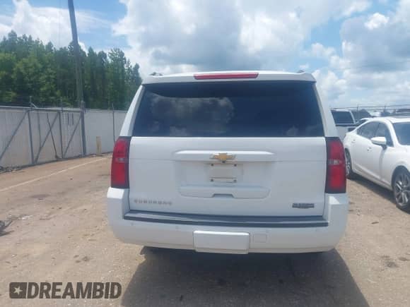 2015 Chevrolet Suburban LT z VIN 1GNSCJKC3FR598528, wystawiony jako IAAI lot #42572084 z przebiegiem 135 002 mil mil oraz . Historia ofert i sprzedaży dostępna na DreamBid. Obrazek 17.