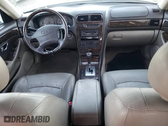 2002 Hyundai XG L z VIN KMHFU45E12A225689, wystawiony jako Copart lot #73006754 z przebiegiem 182 430 mil mil oraz Szkoda całkowita • Salvage title. Historia ofert i sprzedaży dostępna na DreamBid. Obrazek 8.