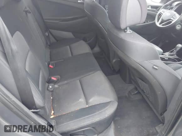 2016 Hyundai Tucson SE with VIN KM8J23A45GU221402, listed as a IAAI auction lot 43378531 with 151,478 mi miles and . Bid and sale history available at DreamBid. Image 8.