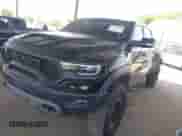 2022 Ram 1500 TRX with VIN 1C6SRFU90NN369047, listed as a IAAI auction lot 42562232 with 14,501 mi miles and . Bid and sale history available at DreamBid. Image 22.