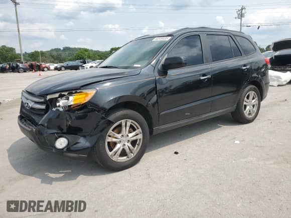 2012 Hyundai Santa Fe Limited z VIN 5XYZK4AG9CG107132, wystawiony jako Copart lot #60558455 z przebiegiem 189 403 mil mil oraz Szkoda całkowita • Salvage title. Historia ofert i sprzedaży dostępna na DreamBid. Obrazek 1.