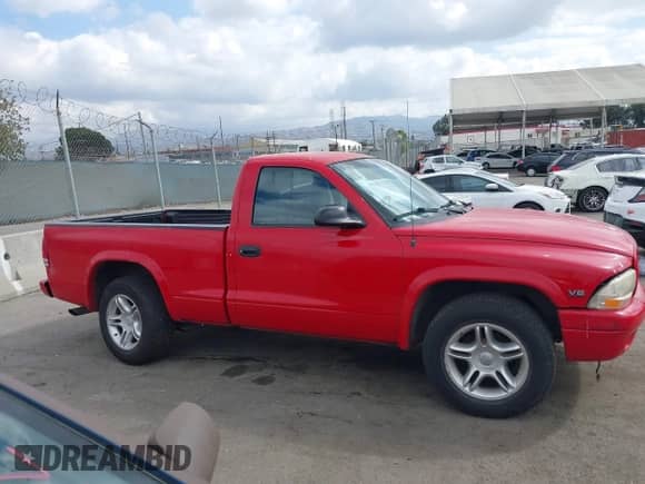 1999 Dodge Dakota SLT with VIN 1B7GL26Z5XS217114, listed as a IAAI auction lot 43418147 with 145,280 mi miles and . Bid and sale history available at DreamBid. Image 13.