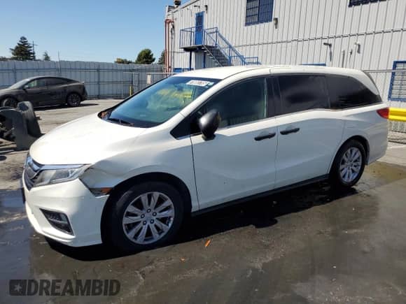 2018 Honda Odyssey LX with VIN 5FNRL6H22JB089113, listed as a Copart auction lot 70083705 with 124,837 mi miles and Clean title. Bid and sale history available at DreamBid. Image 1.