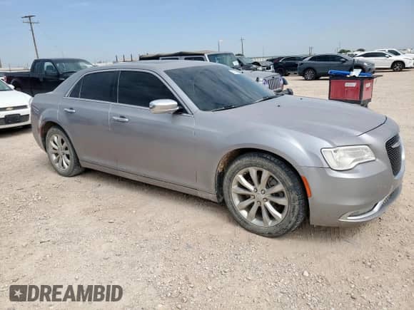 2016 Chrysler 300 C with VIN 2C3CCAKG1GH325416, listed as a Copart auction lot 61260215 with 128,614 mi miles and Salvage title. Bid and sale history available at DreamBid. Image 4.