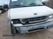 2000 Ford Econoline Cargo with VIN 1FTRE14W2YHB25933, listed as a IAAI auction lot 41912248 with 57,561 mi miles and . Bid and sale history available at DreamBid. Image 12.