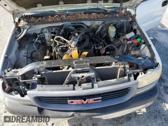 2002 GMC Sierra 1500 z VIN 1GTEC14W12Z170108, wystawiony jako Copart lot #68564144 z przebiegiem Nie podano mil oraz Szkoda całkowita • Salvage title. Historia ofert i sprzedaży dostępna na DreamBid. Obrazek 11.