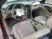 2004 Ford Mustang Deluxe с VIN 1FAFP444X4F112744, выставлен на аукционе Copart как лот 86508014 с пробегом 131 560 миль миль и Списание • Salvage title. История ставок и продаж доступна на DreamBid. Изображение 8.