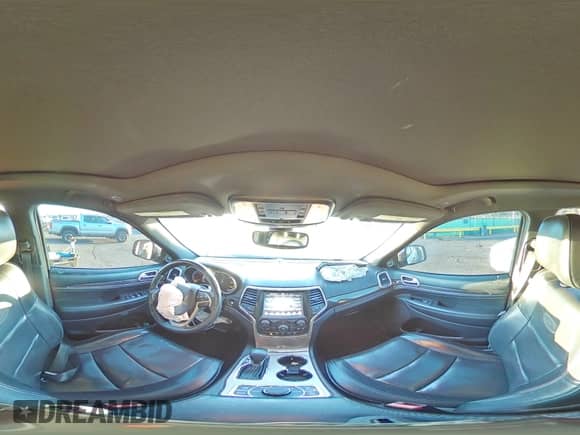 2017 Jeep Grand Cherokee Overland with VIN 1C4RJFCGXHC756588, listed as a Copart auction lot 84282675 with 101,960 mi miles and Salvage title. Bid and sale history available at DreamBid. Image 15.