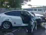 2022 Tesla Model Y Long Range z VIN 7SAYGDEE2NF431316, wystawiony jako IAAI lot #42625983 z przebiegiem 26 748 mil mil oraz . Historia ofert i sprzedaży dostępna na DreamBid. Obrazek 13.