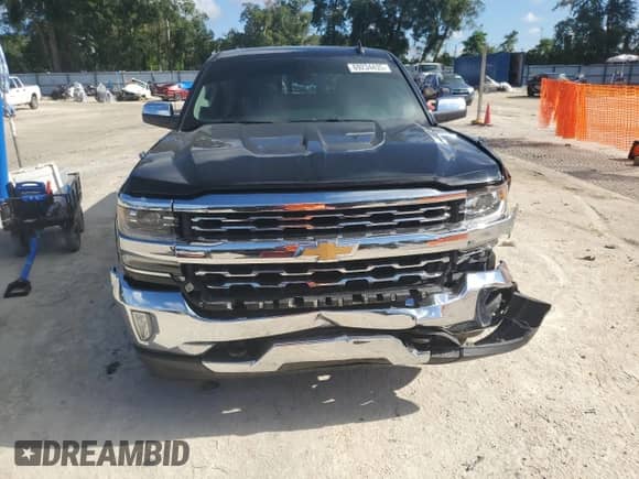 2017 Chevrolet Silverado 1500 LTZ with VIN 3GCPCSEC8HG300946, listed as a Copart auction lot 69234435 with 95,792 mi miles and Salvage title. Bid and sale history available at DreamBid. Image 5.