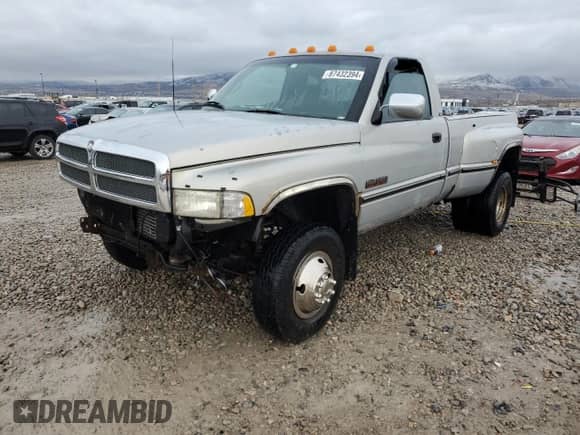 1997 Dodge RAM with VIN 1B7MF36D0VJ607125, listed as a Copart auction lot 87432394 with 243,794 mi miles and Salvage title. Bid and sale history available at DreamBid. Image 1.