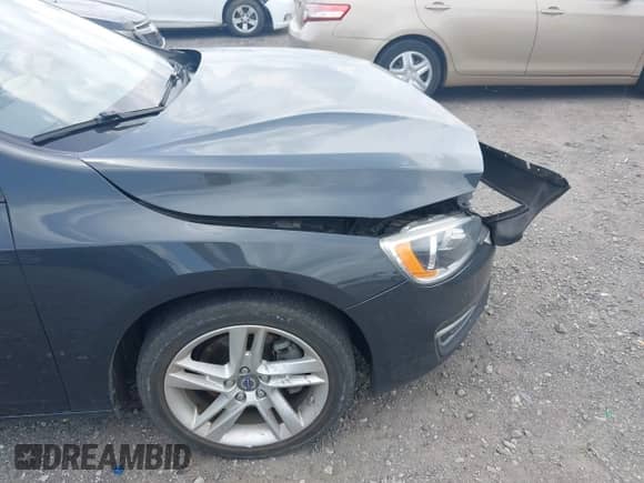 2015 Volvo S60 T5 Drive-E Premier with VIN YV140MFK4F2337702, listed as a IAAI auction lot 42771004 with 129,348 mi miles and . Bid and sale history available at DreamBid. Image 13.