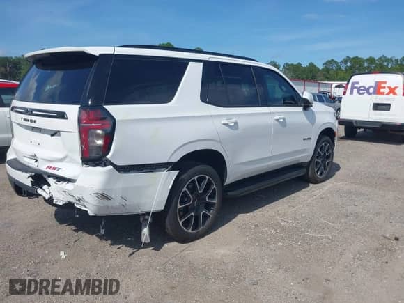 2024 Chevrolet Tahoe RST with VIN 1GNSCRKD2RR417057, listed as a IAAI auction lot 42925915 with 13,841 mi miles and . Bid and sale history available at DreamBid. Image 4.