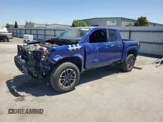 2024 Toyota Tacoma SR5 with VIN 3TMKB5FN4RM003206, listed as a Copart auction lot 64324035 with 8,012 mi miles and Salvage title. Bid and sale history available at DreamBid. Image 1.