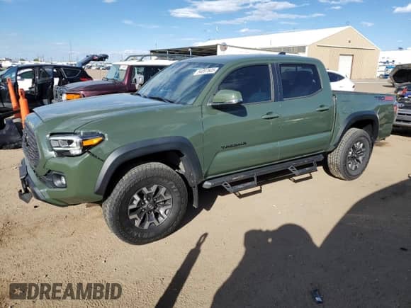 2022 Toyota Tacoma SR с VIN 3TMCZ5AN7NM519528, выставлен на аукционе Copart как лот 84897605 с пробегом 26 429 миль миль и Списание • Salvage title. История ставок и продаж доступна на DreamBid. Изображение 1.