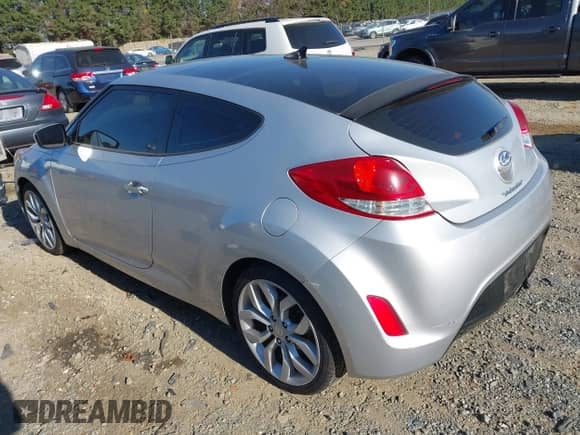 2013 Hyundai Veloster w/Gray Int with VIN KMHTC6AD5DU161303, listed as a IAAI auction lot 43544609 with 134,047 mi miles and . Bid and sale history available at DreamBid. Image 3.