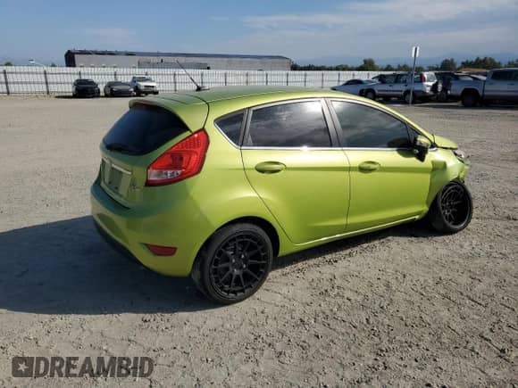 2011 Ford Fiesta SES with VIN 3FADP4FJ5BM157100, listed as a Copart auction lot 82081325 with 77,710 mi miles and Salvage title. Bid and sale history available at DreamBid. Image 3.