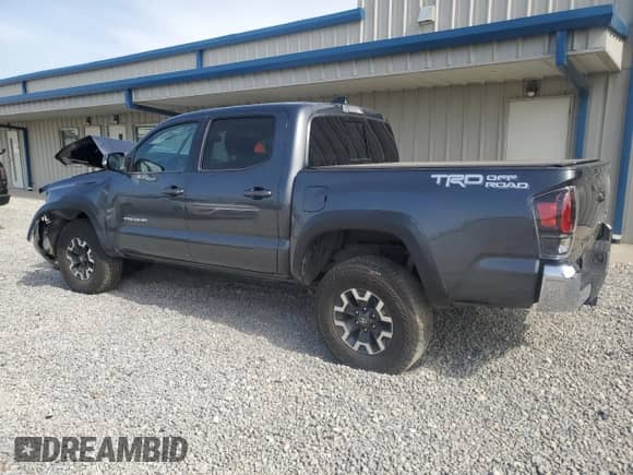 2023 Toyota Tacoma SR5 z VIN 3TMAZ5CN8PM197537, wystawiony jako Copart lot #57041955 z przebiegiem 43 412 mil mil oraz Szkoda całkowita • Salvage title. Historia ofert i sprzedaży dostępna na DreamBid. Obrazek 2.