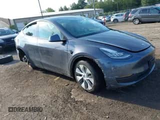 2021 Tesla Model Y Long Range with VIN 5YJYGDEE2MF249823, listed as a IAAI auction lot 43279589 with 52,062 mi miles and . Bid and sale history available at DreamBid. Image 1.