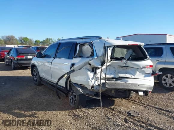 2020 Honda Pilot Touring 7-Passenger с VIN 5FNYF5H6XLB016364, выставлен на аукционе IAAI как лот 41802886 с пробегом 74 778 миль миль и . История ставок и продаж доступна на DreamBid. Изображение 14.