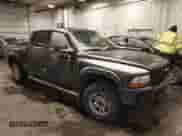 2003 Dodge Dakota Sport with VIN 1D7HG38N83S115959, listed as a IAAI auction lot 41594423 with 234,411 mi miles and . Bid and sale history available at DreamBid. Image 1.