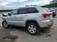 2012 Jeep Grand Cherokee Laredo z VIN 1C4RJEAG7CC236189, wystawiony jako Copart lot #85944985 z przebiegiem Nie podano mil oraz Szkoda całkowita • Salvage title. Historia ofert i sprzedaży dostępna na DreamBid. Obrazek 2.