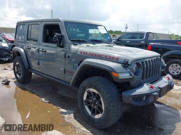 2021 Jeep Wrangler Unlimited Rubicon with VIN 1C4HJXFG1MW669832, listed as a IAAI auction lot 42731691 with 34,931 mi miles and . Bid and sale history available at DreamBid. Image 1.