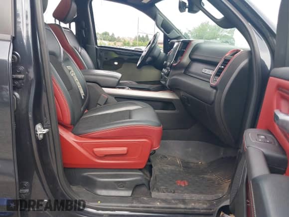 2019 Ram 1500 Rebel z VIN 1C6SRFLT1KN784936, wystawiony jako IAAI lot #42375986 z przebiegiem 78 539 mil mil oraz . Historia ofert i sprzedaży dostępna na DreamBid. Obrazek 5.