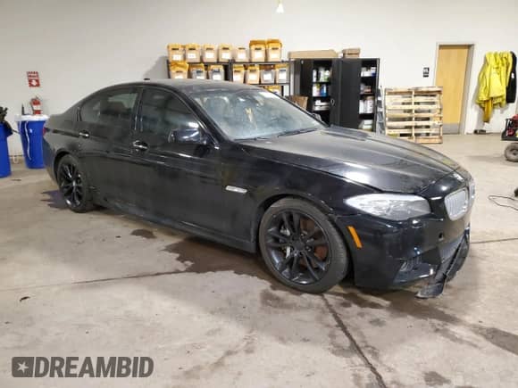2013 BMW 5 Series 550i с VIN WBAFR9C51DDX79562, выставлен на аукционе Copart как лот 60500185 с пробегом 115 438 миль миль и Списание • Salvage title. История ставок и продаж доступна на DreamBid. Изображение 4.