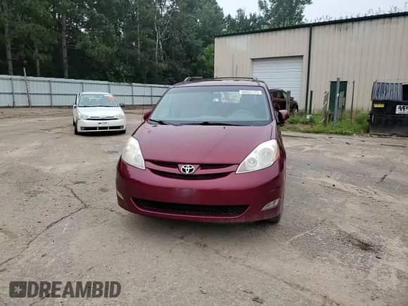 2010 Toyota Sienna XLE с VIN 5TDYK4CC9AS298444, выставлен на аукционе Copart как лот 69422175 с пробегом 245 524 миль миль и Списание • Salvage title. История ставок и продаж доступна на DreamBid. Изображение 14.