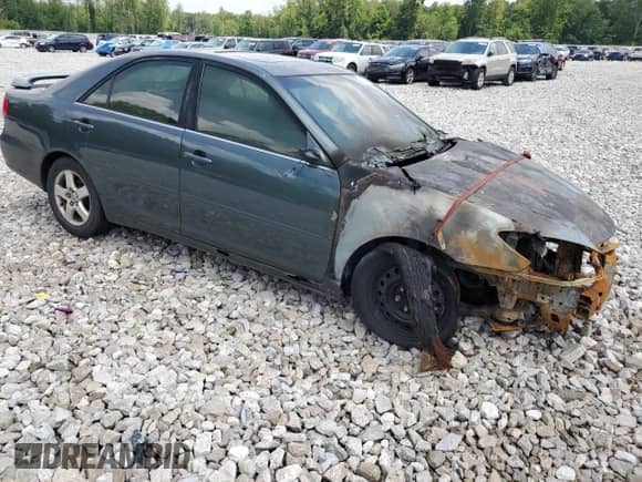 2002 Toyota Camry LE с VIN 4T1BE32K92U502491, выставлен на аукционе Copart как лот 89493885 с пробегом Не указан миль и Списание • Salvage title. История ставок и продаж доступна на DreamBid. Изображение 4.