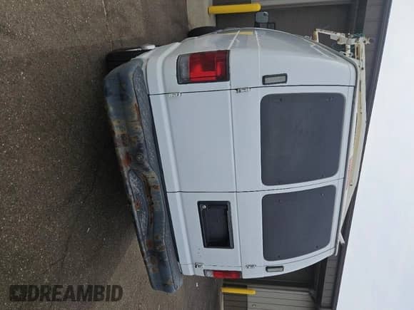 2011 Ford Econoline Cargo Commercial with VIN 1FTNE2EL4BDA70943, listed as a IAAI auction lot 43552276 with 141,096 mi miles and . Bid and sale history available at DreamBid. Image 34.