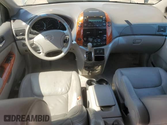 2007 Toyota Sienna XLE с VIN 5TDZK22C67S071490, выставлен на аукционе Copart как лот 62868355 с пробегом 201 036 миль миль и Списание • Salvage title. История ставок и продаж доступна на DreamBid. Изображение 8.