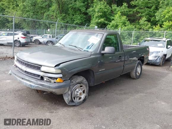 2000 Chevrolet Silverado 2500 LS z VIN 1GCGC24U9YE369761, wystawiony jako IAAI lot #42334289 z przebiegiem 245 783 mil mil oraz . Historia ofert i sprzedaży dostępna na DreamBid. Obrazek 17.