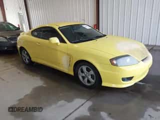 2006 Hyundai Tiburon GS with VIN KMHHM65D66U191779, listed as a IAAI auction lot 43360761 with 106,842 mi miles and . Bid and sale history available at DreamBid. Image 1.