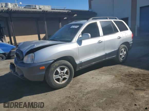2001 Hyundai Santa Fe GLS z VIN KM8SC83D51U097893, wystawiony jako Copart lot #42773215 z przebiegiem 113 181 mil mil oraz Szkoda całkowita • Salvage title. Historia ofert i sprzedaży dostępna na DreamBid. Obrazek 1.