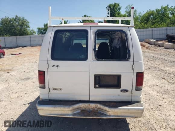 2002 Ford Econoline Cargo with VIN 1FTRE14272HA73588, listed as a Copart auction lot 56753015 with 243,587 mi miles and Salvage title. Bid and sale history available at DreamBid. Image 6.