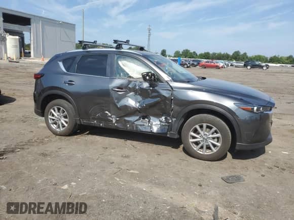 2023 Mazda CX-5 S Select with VIN JM3KFBBM4P0271602, listed as a Copart auction lot 66711345 with 21,328 mi miles and Salvage title. Bid and sale history available at DreamBid. Image 4.